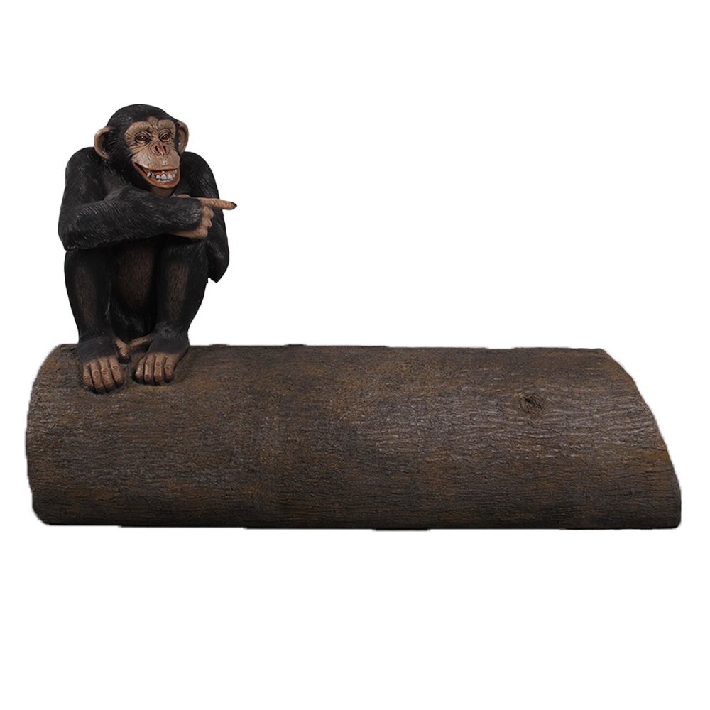Location d'un chimpanzé assis sur un tronc