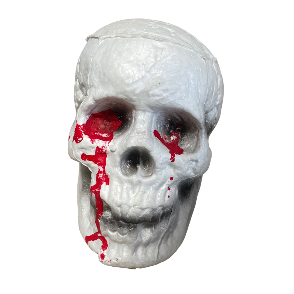 Crâne polystyrène avec yeux ensanglantés